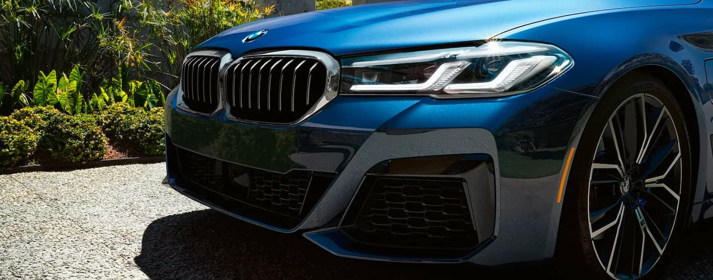 A closeup shows the grille of a 2018 BMW 5 Series after it has left a used BMW dealer near you.