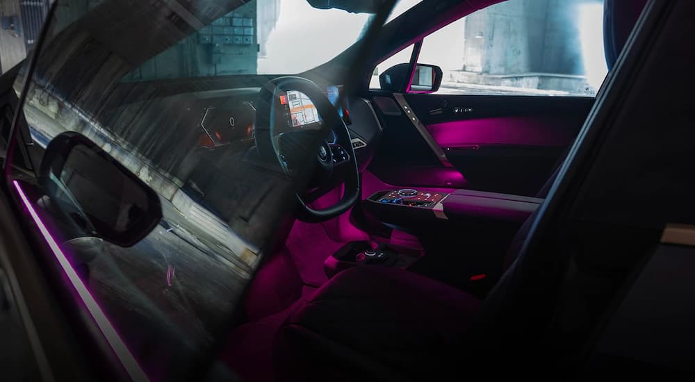 The black interior is shown in a 2022 BMW iX M60.